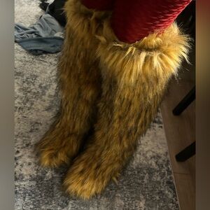 Tall furry boot